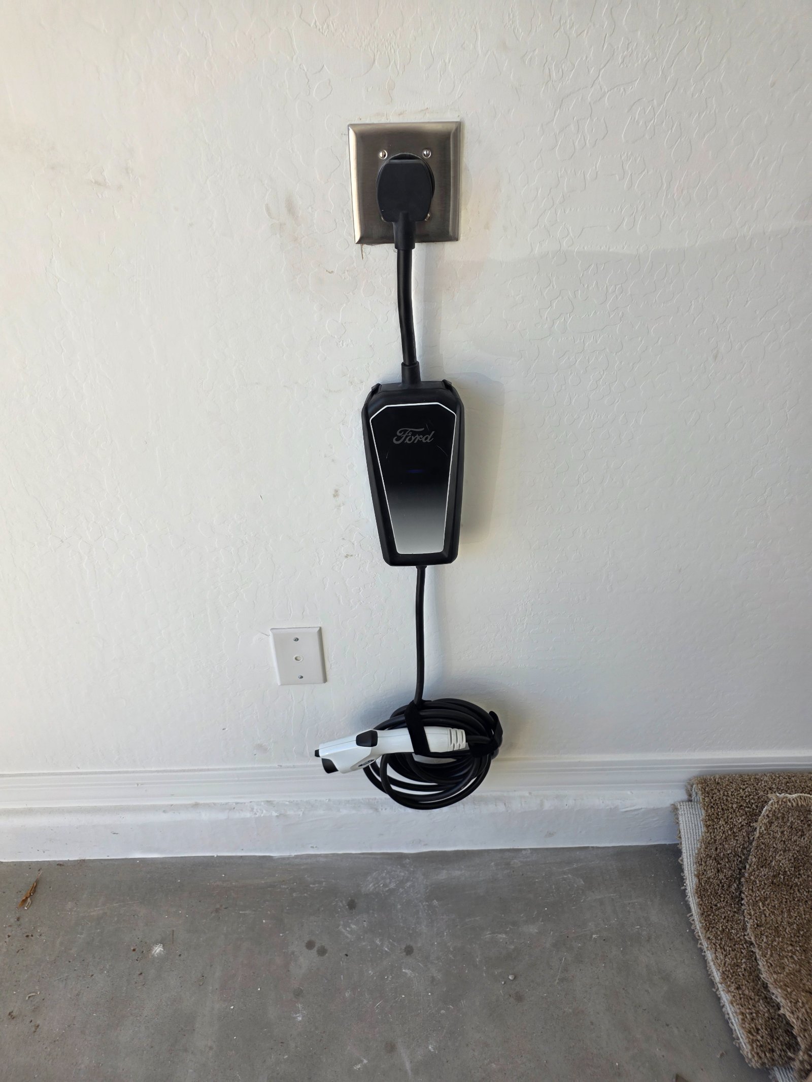 Install fifty amp chargeand charging outlet on a job site in Peoria, AZ